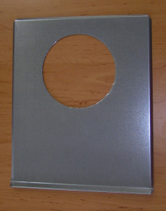 Plech krycí na fasádu (k odtahu z topidla) ø otvoru 165 mm